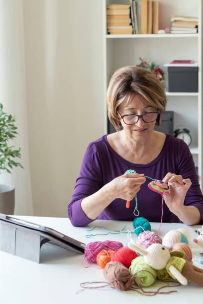 istock Senior woman working from home 1314216111