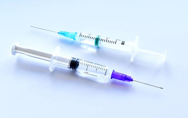 istock Medical syringe with a vaccine 1314216522