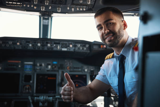 istock Contented male pilot showing his confidence before the flight 1314219579