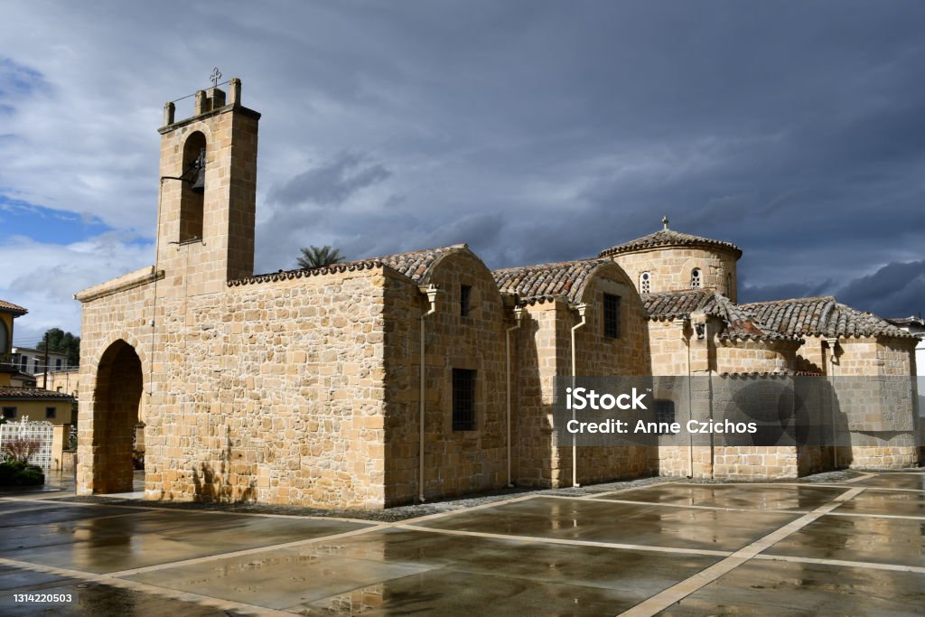 Panagia Chrysaliniotissa Church in Nicosia, Cyprus Panagia Chrysaliniotissa, a 15th-century Byzantine church in Nicosia, Cyprus, seen as the sun is coming out after a storm. Republic Of Cyprus Stock Photo