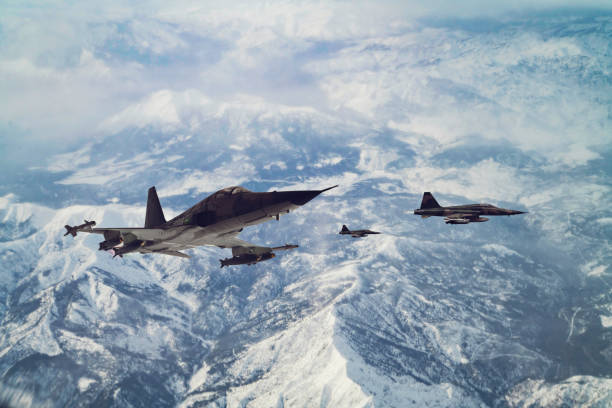 istock Jet airplanes flying over the clouds. 1314224916