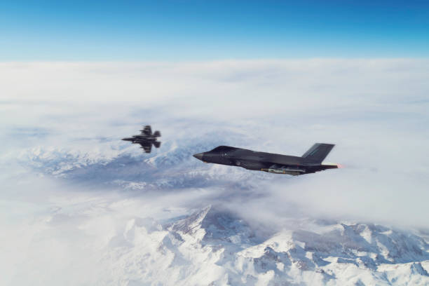 istock Jet airplanes flying over the clouds. 1314226007