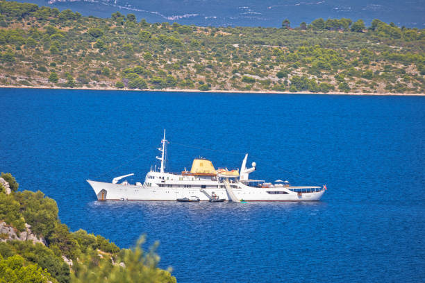 Christina O yacht in Kornati National Park view, Dalmatia archipelago of Croatia. Kornati, Croatia, August 17 2019: Christina O yacht in Kornati National Park, Dalmatia archipelago of Croatia. One of most famous yachts ever, previously owned by Aristotel Onassis. dugi otok island stock pictures, royalty-free photos & images