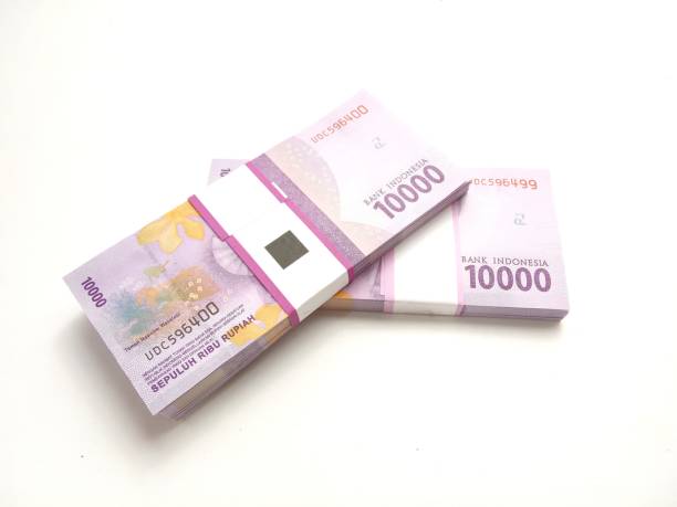 istock stack of bundle Ten Thousand Rupiah Indonesia Money, at White Background 1314233626