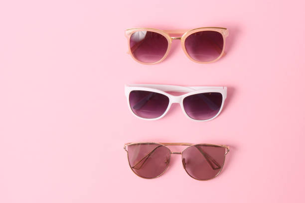 istock set of sunglasses on a colored background top view. 1314236550