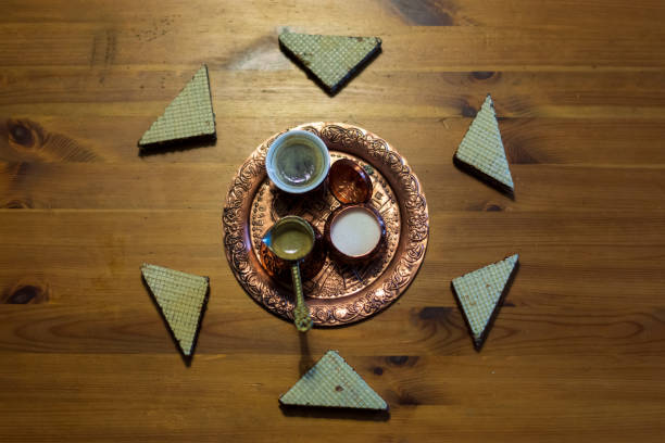 istock Oriental coffee in traditional Turkish copper coffee pot and matching cup 1314238974