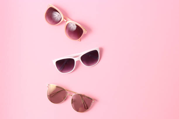 istock set of sunglasses on a colored background top view. 1314242764