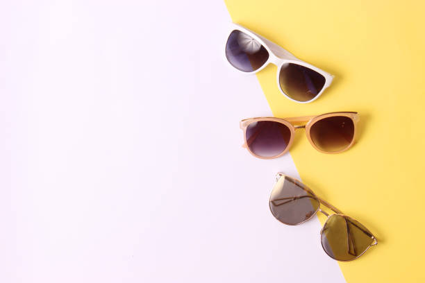istock set of sunglasses on a colored background top view. 1314242798
