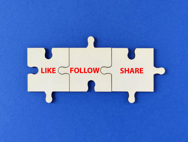 istock Like follow share puzzle concept, white jigsaw puzzle connecting together on blue background 1314246446