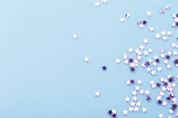 istock Purple stars on blue background 1314247111