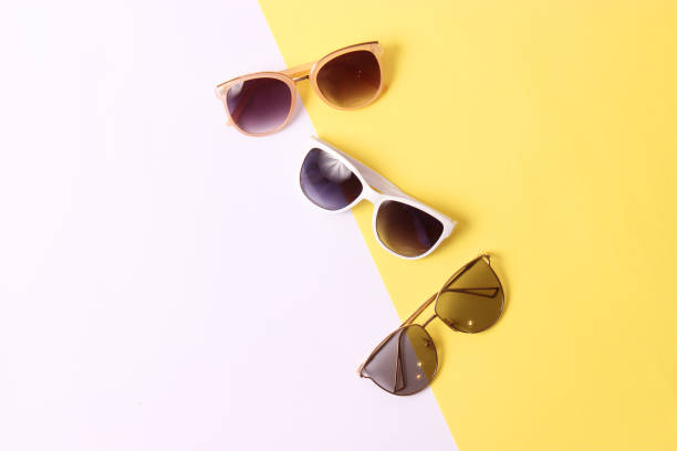 istock set of sunglasses on a colored background top view. 1314259296