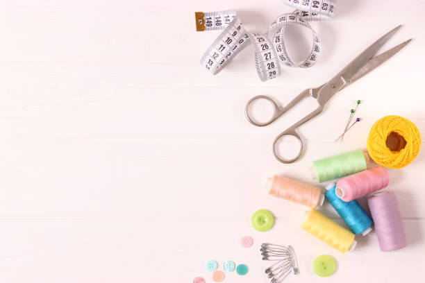 istock sewing accessories close-up. hobbies, fabrics and threads for sewing 1314264123