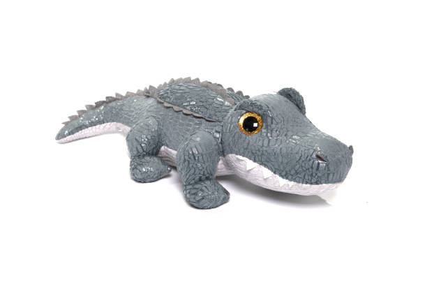 istock Plush toy crocodile isolated on white background 1314268518