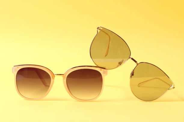 istock set of sunglasses on a colored background top view. 1314269065