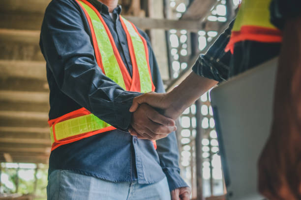 istock people shake hand on site building real estate project 1314269193