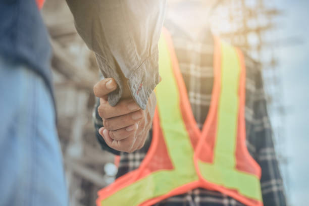 istock people shake hand on site building real estate project 1314269310