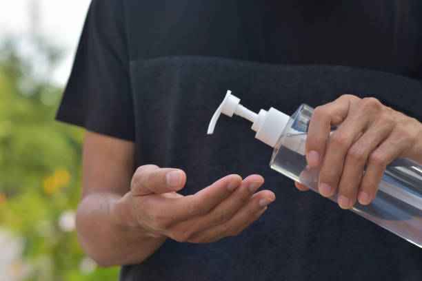 istock Man using alcohol gel cleaning hand protect coronavirus covid19 1314270060