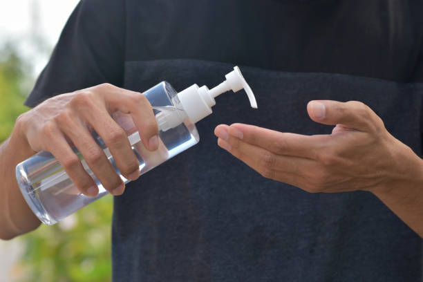 istock Man using alcohol gel cleaning hand protect coronavirus covid19 1314270067