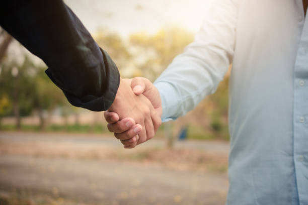 istock Group people hand in hand concept partner teamwork community 1314270095