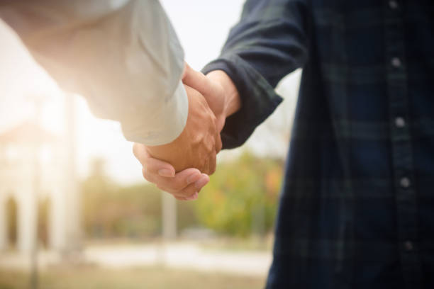 istock Group people hand in hand concept partner teamwork community 1314270136