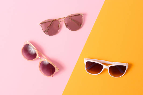 istock set of sunglasses on a colored background top view. 1314282063