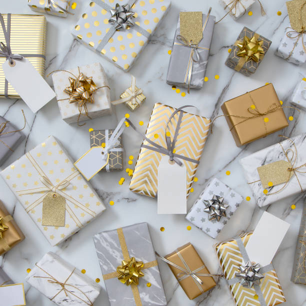 istock Many gift boxes with labels numbers wrapped in glossy classical pack ready for celebrating holiday 1314283720
