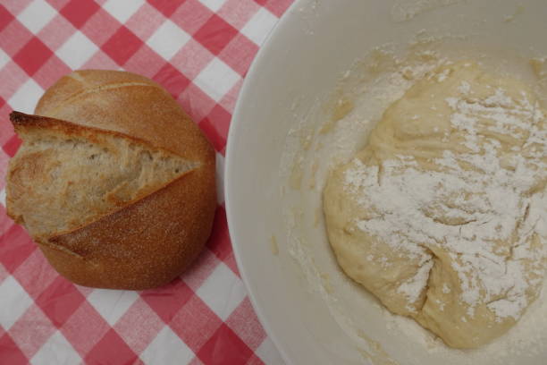 istock Kneading dough in preparation for making a round loaf 1314284634
