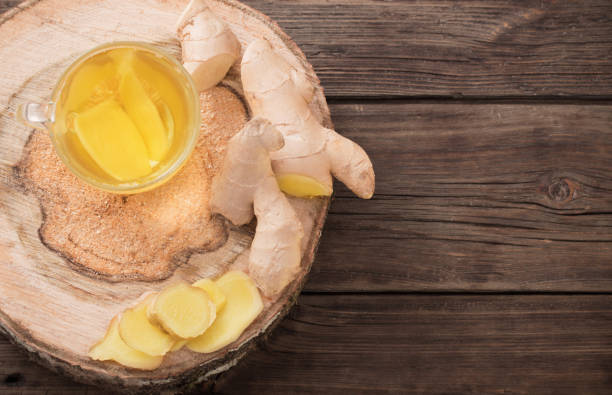 istock ginger tea on old wooden background 1314286288