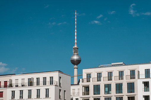 real estate in Berlin concept - apartment buildings and tv tower -