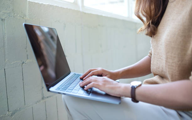istock a woman working and typing on laptop computer keyboard 1314292665