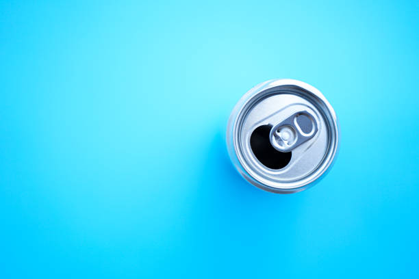 istock Flat lay of aluminum can opened on blue background with copy space 1314293361
