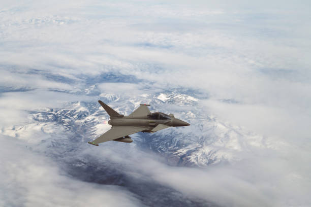 istock Fighting  jet airplanes flying fast with agile movements. 1314293832