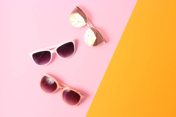 istock set of sunglasses on a colored background top view. 1314295765