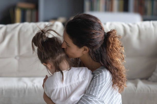istock Loving mom hug and cuddle small daughter 1314299044