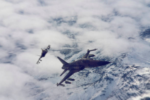 istock jet airplanes flying over the clouds. 1314300355