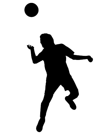 Boy soccer player hits the ball with his head silhouette