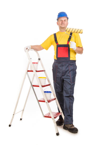 istock Worker on the ladder with a paint roller. 1314304922