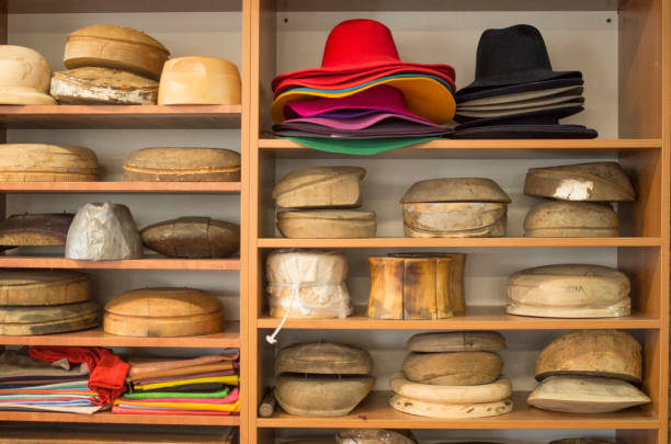 istock Wooden hat blocks for felt hats and felt hats in a hat workshop 1314308072