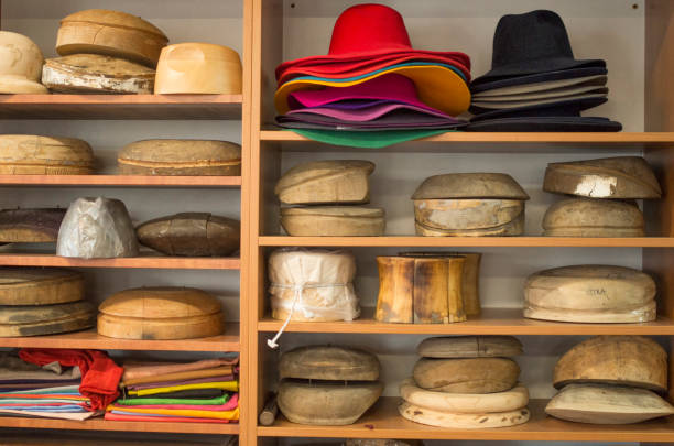 istock Wooden hat blocks for felt hats and felt hats in a hat workshop 1314308073