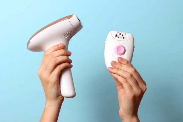istock Home modern photoepilator and mechanical epilator in female hands. 1314312568