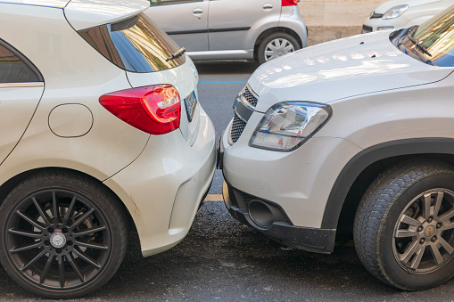 Sanremo, Italy - Apr 18, 2019: Parking two cars bumper to bumper without distance