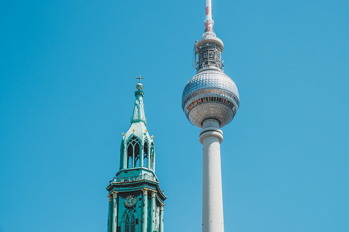 The Berlin Television tower (Fernsehturm) and Church St Mary in Berlin, Germany