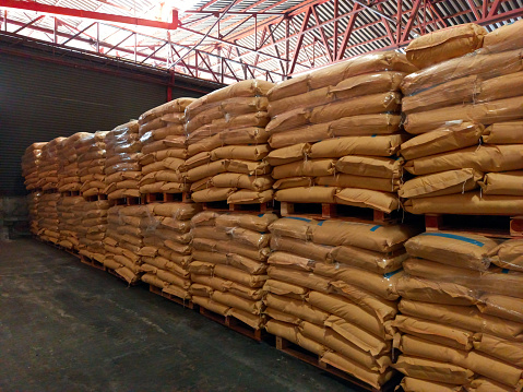 Chemical fertilizer Urea Stockpile white jumbo-bag Large ammonia nitrate in waiting for shipment is placed in the warehouse. Transport for farmers