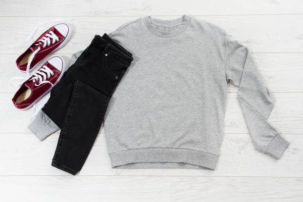 istock Close up gray blank template sweatshirt hoodie with copy space. Top view mockup pullover on white wooden background. Casual outfit. Flat lay template clothes. 1314322150
