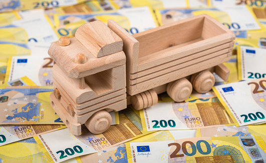200 Euro banknotes with wooden truck - Insurance or costs