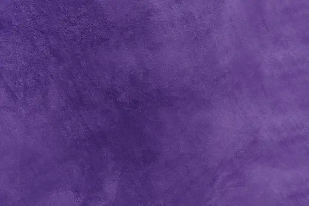 soft smooth purple plush fleece. velvet texture background. Synthetic fur violet texture Blanket Pattern.