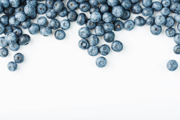 istock Tasty blueberries fruit are scattered on a white background. Frame 1314327112