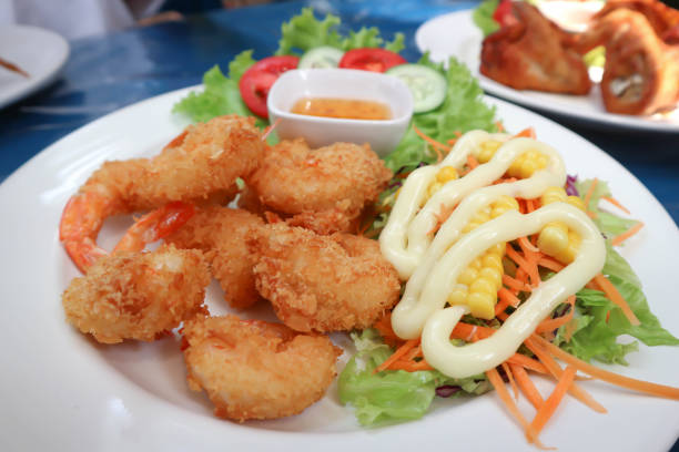 istock deep fried shrimp, fried shrimp or shrimp salad 1314330237