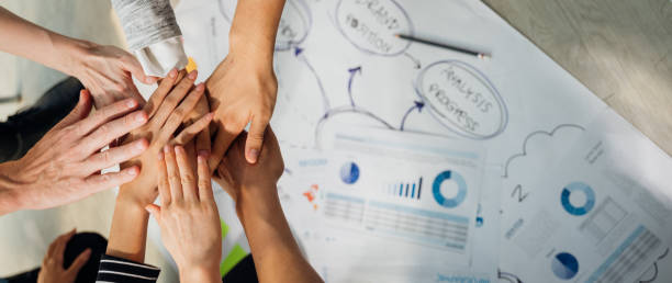 istock Panoramic teamwork business join hand together concept, Business team standing hands together, Volunteer charity work. People joining for cooperation success business. 1314331320