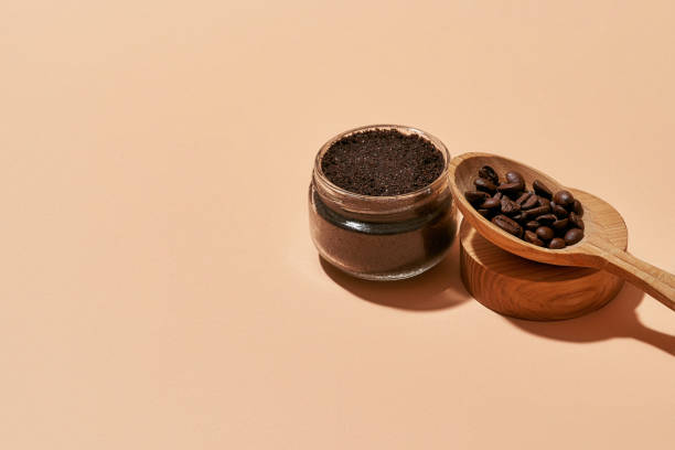 istock Cosmetological scrub in open can beside wooden spoon 1314334360